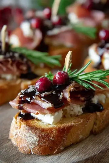 Cranberry, Brie and Prosciutto Crostini with Balsamic Glaze